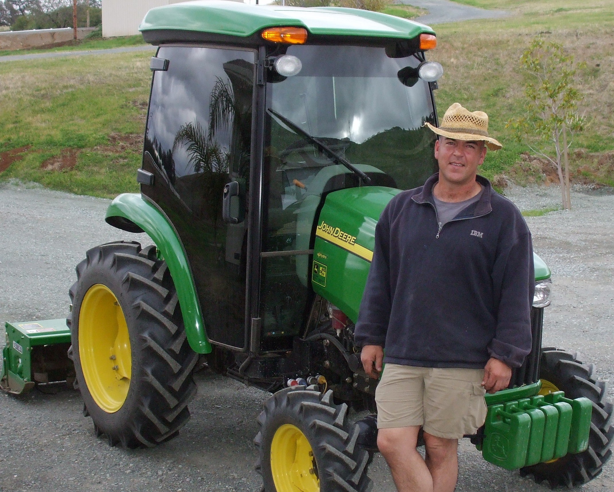 Stavros the olive farmer with John Deere tractor
